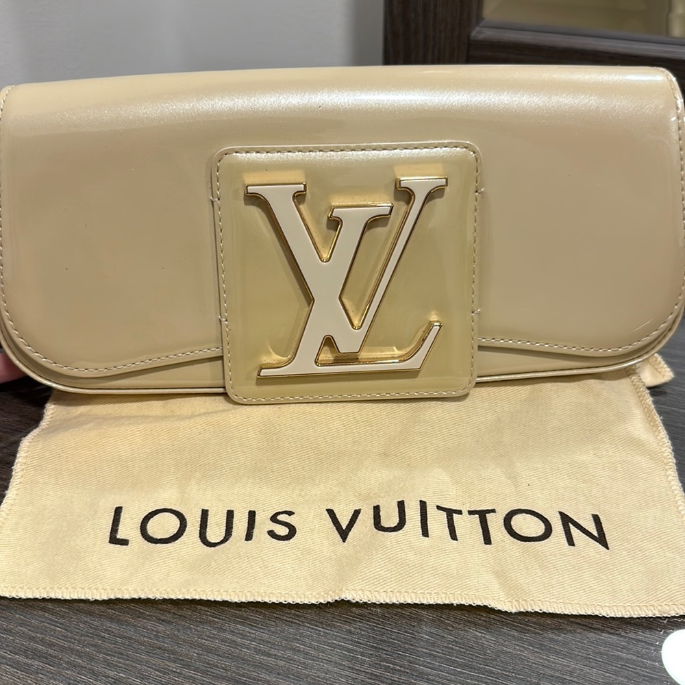 Louis Vuitton Sobe Ivory clutch